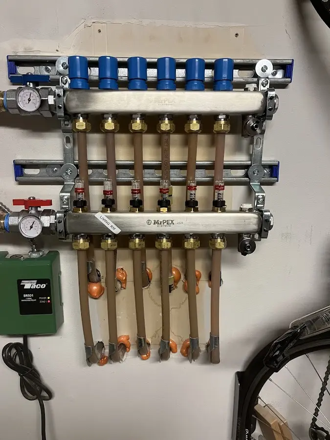 Plumber performing Leak Detection at a residential property in Warm Beach